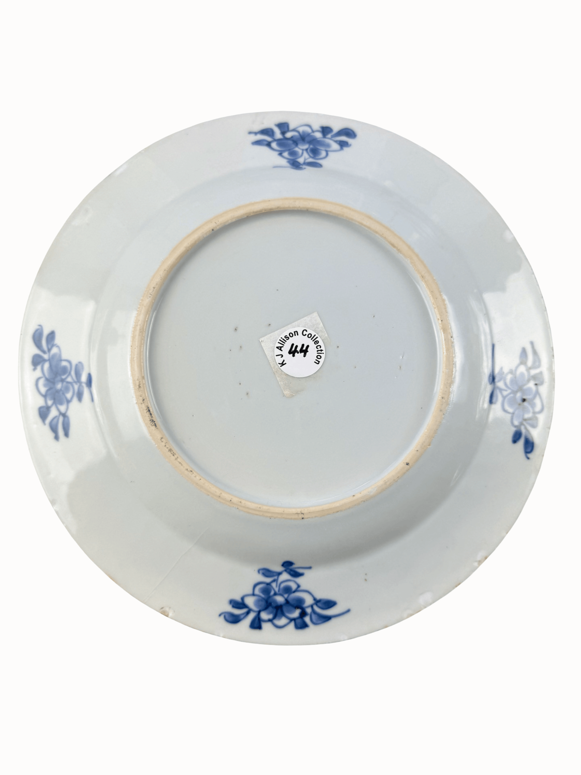 Antique Qianlong period blue and white plate base with floral designs, ex K J Allison Collection.
